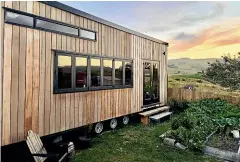  ?? ?? Flack’s tiny home, vege patch and country view.