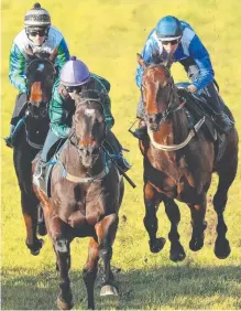  ??  ?? EASY DOES IT: Hugh Bowman on Winx (right) yesterday.