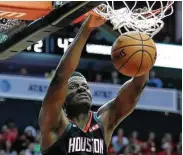  ?? Brett Coomer / Staff photograph­er ?? Rockets center Clint Capela averages 16.8 points per game on 64.3 percent shooting from the field.