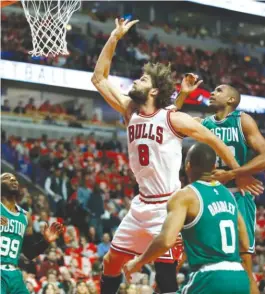  ?? | NAM Y. HUH/ AP ?? Bulls center Robin Lopez, whose contract runs through the 2018- 19 season, believes the team has improved and would like to return next season.