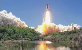  ??  ?? The space shuttle Discovery lifts off at Kennedy Space Center on July 4, 2006. | AP