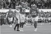  ?? Marcio Jose Sanchez/associated Press ?? Baker Mayfield (17) celebrates after leading the Rams on a game-winning 98-yard drive Thursday.