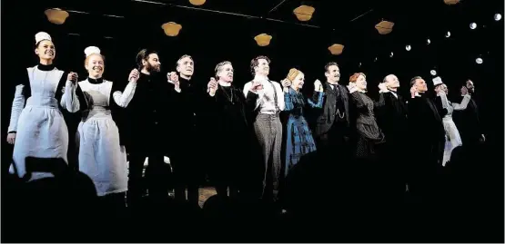  ?? Getty Images ?? The cast of “The ElephantMa­n” takes a bow on opening night in New York. The show starred Bradley Cooper, Patricia Clarkson and Alessandro Nivola, who are clustered in the middle. The nurses at left are Emma Thorne and Amanda LeaMason.