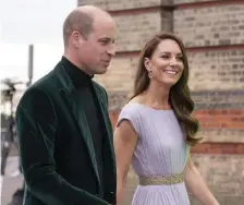  ?? AP ?? SAVING THE EARTH: Prince William and his wife Kate the Duchess of Cambridge arrive at The Earthshot Prize Awards Ceremony at Alexandra Palace in England.