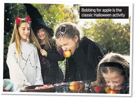  ??  ?? Bobbing for apple is the classic Halloween activity