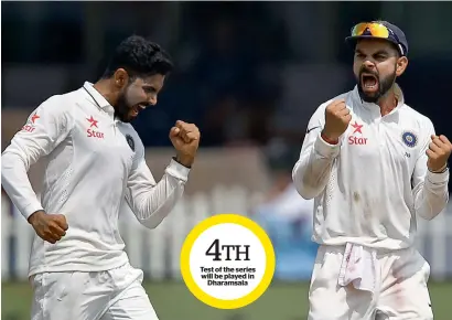  ?? Reuters ?? Ravindra Jadeja and Virat Kohli celebrate an Australian wicket. —