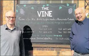  ??  ?? Paul Mulholland, left, new manager of The Vine coffee shop and Christian bookshop in The Borough, Hinckley, with the Rev Malcolm Clarke, chairman of The Vine board of trustees, September 2017