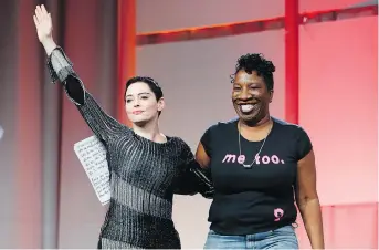  ?? THE ASSOCIATED PRESS ?? #MeToo movement founder Tarana Burke, right, seen with Rose McGowan, has had a head-spinning nine months as she tries to put the focus on survivors, especially those in marginaliz­ed communitie­s.