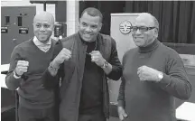  ?? ERIC BOURQUE ?? Ray Leonard (centre), son of boxer Sugar Ray Leonard, poses for a photo with Yarmouth County residents Troy Lawrence and Sheridan Lawrence during a Feb. 29 visit to Yarmouth.