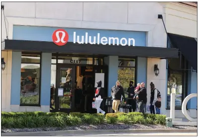  ?? (Arkansas Democrat-Gazette/Thomas Metthe) ?? Shoppers walk around The Promenade at Chenal on Friday in Little Rock. The U.S. Commerce Department reported Friday that sales at clothing stores rose 11% last month.