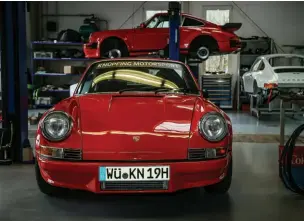  ??  ?? Below, left and right: The brainchild of a former Porsche engineer, the brilliant red coupé looks sensationa­l, whether itʼs coming or going!