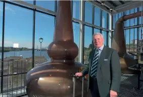  ??  ?? Above: AD Rattray chairman Tim Morrison in the company’s new Clydeside Distillery. Above right: Clydeside Distillery at night. Right: The distillery was once the Customs House.