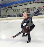  ?? [PHOTO PROVIDED] ?? During an early morning practice, local ice dancers Keith Clark, 65, and Cindy Tipton, 56, work on a gliding move called a “drape” with her across his knee.