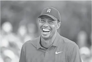  ?? JOHN DAVID MERCER/USA TODAY SPORTS ?? Tiger Woods reacts after winning the Tour Championsh­ip in August, his first PGA Tour victory in five years.
