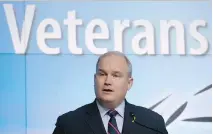  ?? A D R I A N WY L D / T H E C A NA D I A N P R E S S ?? Minister of Veterans Affairs Erin O’Toole unveils new a critical injury benefit in Ottawa on Monday.