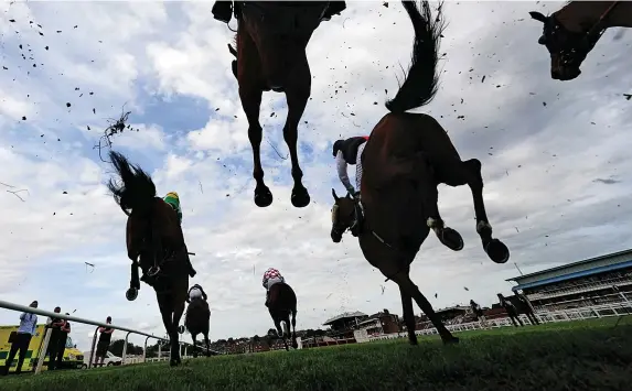  ?? Picture: David Davies/PA ?? THURSDAY, MAY 19, 2022
Runners and riders in action in the Watch On Racing TV Chandler Handicap Chase at Warwick yesterday.
HORSE RACING: PAGES 34-37