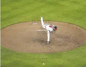  ?? Mike Zarrilli / Getty Images ?? The Braves’ Anibal Sanchez throws a pitch in the sixth inning against the Padres. He allowed only four hits in seven scoreless innings as Atlanta won 4-2.