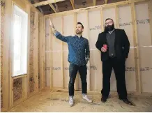  ?? DAVID BLOOM ?? Municipal Affairs Minister Shaye Anderson, right, gets a tour of a home building site from UrbanAge Homes’ Richard Nault.