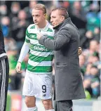  ??  ?? Leigh Griffiths with manager Brendan Rodgers.
