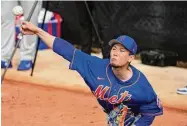  ?? Jeff Roberson/Associated Press ?? Mets pitcher Kodai Senga throws a bullpen session during spring training practice on Thursday in Port St. Lucie, Fla.