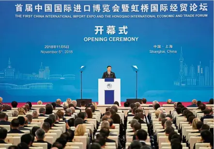  ??  ?? Xi at CIIE opening: China will take further steps to lower tariffs and reduce import costs. — AFP