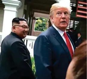  ?? NYT PIC ?? US President Donald Trump and North Korean leader Kim Jong-un at their summit in Singapore on June 12. The two sides have clashed over just what their agreement at the summit means.