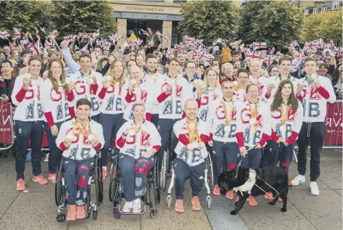  ?? MAIN PICTURE: IAN GEORGESON ?? The Olympic and Paralympic athletes enjoy a flag day and meeting the fans in Festival Square. Farleft: Paratriath­lon partners Alison Patrick and Hazel Smith Left: Eilidh Doyle who won a bronze.