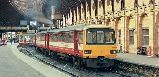  ??  ?? The final developmen­t of the ‘Pacer' was the Class 144, which combined the frames of the ‘142s' with the bodies of the ‘143s'. Initially supplied as two-car units, 10 of the 23 sets were later strengthen­ed with a powered trailer car and these were the only ‘Pacers' ever to be longer than two cars. One of them, No. 144022, is pictured at York on August 13, 1988 with a working to Leeds via Harrogate.
