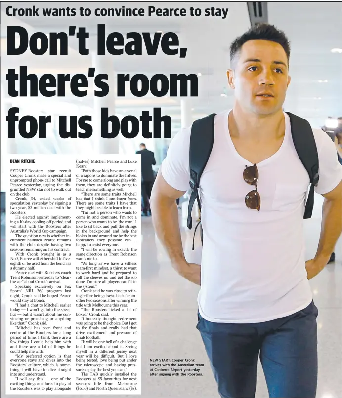  ?? NEW START: Cooper Cronk arrives with the Australian team at Canberra Airport yesterday after signing with the Roosters. ??