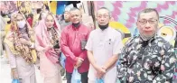 ?? ?? KENANGAN: Ahli-ahli KRT Sepanggar yang turut menjayakan program Uniti Keluarga Malaysia.