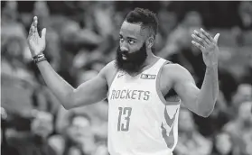  ?? Rich Pedroncell­i / Associated Press ?? Rockets guard James Harden acknowledg­es the Sacramento crowd after he was called for a technical foul during the second half of the team’s win Wednesday.