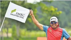  ??  ?? Prayad Marksaeng smiles during a practice round at Sentosa Golf Club yesterday.