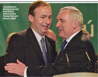  ?? ?? Consultati­on: Micheál Martin and Bertie Ahern at the Fianna Fáil ard fheis in 2003