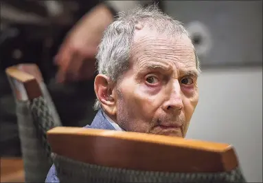  ?? Robyn Beck / Associated Press ?? Real estate heir Robert Durst looks back during his murder trial in Los Angeles on March 5, 2020. A New York prosecutor will seek an indictment in the coming weeks against Durst for the death of his former wife, Kathie Durst, who disappeare­d in 1982, a person familiar with the matter told The Associated Press on Oct. 8.