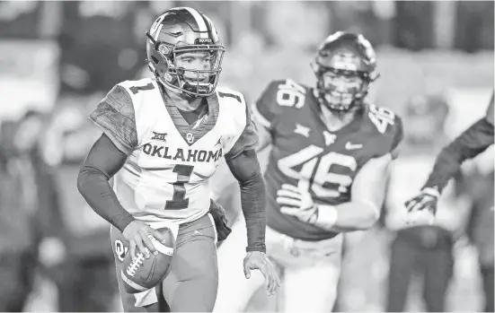  ?? BEN QUEEN/USA TODAY SPORTS ?? Quarterbac­k Kyler Murray (1) accounted for four touchdowns, including one on a run, to help Oklahoma erase four West Virginia leads and defeat the Mountainee­rs to earn a berth in the Big 12 championsh­ip game.