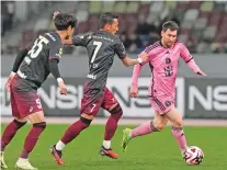  ?? EUGENE HOSHIKO/ASSOCIATED PRESS FILE PHOTO ?? Inter Miami’s Lionel Messi, right, plays against a Japanese team on Feb. 7 in Tokyo. China has canceled matches after Messi sat out a match against Hong Kong, sparking and a fan backlash.