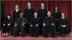  ?? J. SCOTT APPLEWHITE-ASSOCIATED PRESS FILE ?? Members of the Supreme Court sit for a new group portrait following the addition of Associate Justice Ketanji Brown Jackson, at the Supreme Court building in Washington, on Oct. 7, 2022.