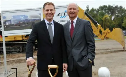  ?? BRENT DAVIS, RECORD STAFF ?? ATS Automation CEO Andrew Hider, left, and Bruce Power CEO Mike Rencheck took part in a groundbrea­king ceremony at Thursday.