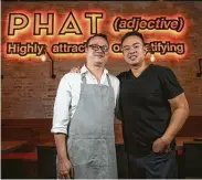  ??  ?? Chef-owner Alex Au-Yeung, left, and manager Kevin Lee epitomize hospitalit­y.