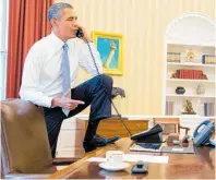  ?? Photo / Pete Souza ?? President Obama at his desk in the Oval Office.