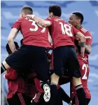  ??  ?? United celebrate their 2-0 derby win