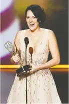  ?? KEVIN WINTER/GETTY IMAGES ?? Phoebe Waller-Bridge accepts the outstandin­g lead actress in a comedy series award for Fleabag.