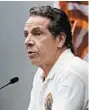  ?? BRYAN R. SMITH/GETTY-AFP ?? New York Gov. Andrew Cuomo often sports polo shirts with the state insignia.