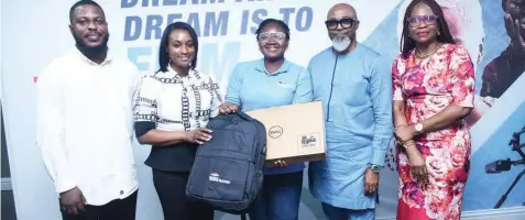  ?? ?? Chief Executive Officer ( CEO), West Africa Multichoic­e, John Ugbe ( second right); Head, Human Resources, Oritsetsol­a Omatseye ( left); Executive Head of Content and Channels, Busola Tejumola; 2024 MTF Academy Entrant, Winner Achimugu and Academy Director West Africa Multichoic­e Talent Factory, Atinuke Babatunde ( right) at the Welcome Session to kick- off the 2024 Class at the Multichoic­e Talent Factory in Lagos.