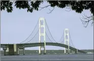  ?? ASSOCIATED PRESS FILE PHOTO ?? The Mackinac Bridge is pictured from Mackinaw City. Supporters and opponents of a proposed oil pipeline tunnel beneath the Great Lakes channel are making their case to federal officials.