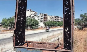  ?? EUROPEAN PRESSPHOTO AGENCY ?? Homs, Syria, bears the marks of national suffering as the civil war drags on.