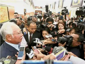 ??  ?? Q&amp; A time: Najib addressing the media at the Parliament lobby.