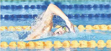  ??  ?? Sarawak’s Welson Sim competes in the men’s 1,500m freestyle final of the Malaysia Open Swimming Championsh­ip at the National Aquatic Centre, Kuala Lumpur Sports City in Bukit Jalil yesterday. — Bernama photo