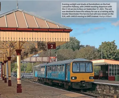  ?? Martyn Hilbert ?? Evening sunlight and shade at Ramsbottom on the East Lancashire Railway, with 144009 awaiting departure with the 17.44 service to Bury on September 17, 2021. The unit was destined to leave the railway for use as a training aid by Greater Manchester Fire Service but will now remain on the ELR, with 144010 moving to GMFS instead.