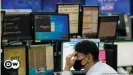  ??  ?? A trader watches monitors at a foreign exchange dealing room in Seoul, South Korea